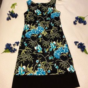 Classy black mid thigh dress with blue flowers